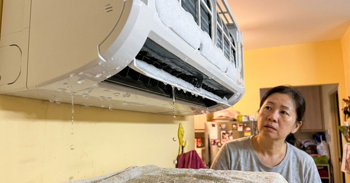 Air conditioner showing warning signs